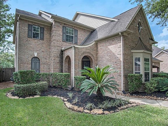 Lush landscaping in front and back yard.