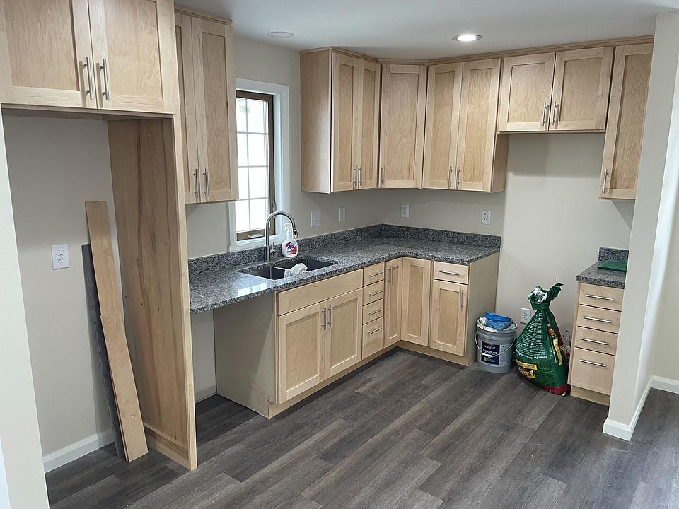 Kitchen. Appliances (refrigerator, stove, dishwasher, microwave) will be installed prior to tenant move in.