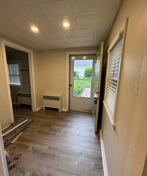 Back Entranceway with Screen Door to Deck