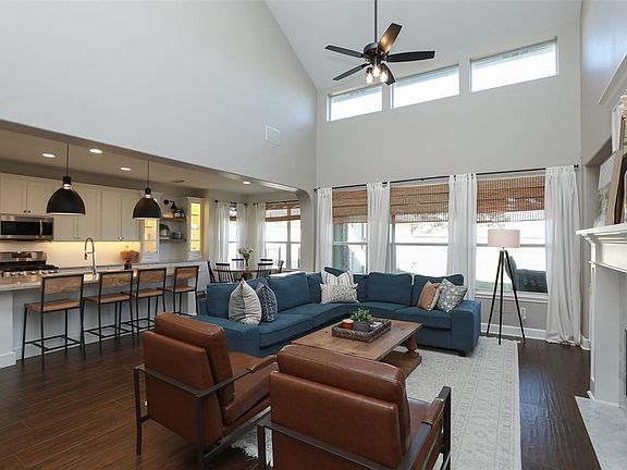 2 Story family room! overlooks covered back porch!