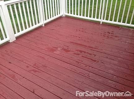Back Deck #1
						:
						Stained, not painted, on rails and decking. Notice how the water beads up!