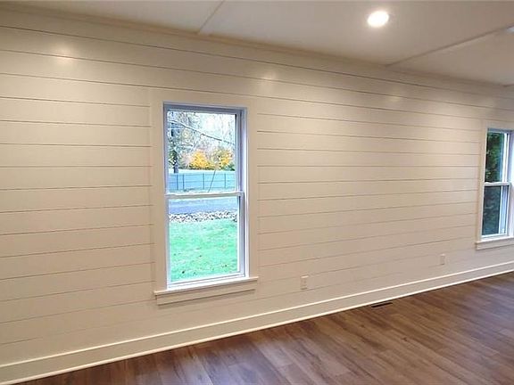 Ship lap feature wall spans the LR/DR area