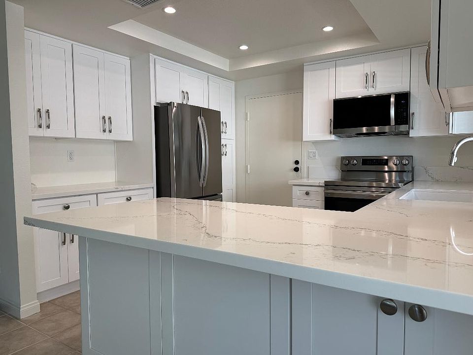 Truly functional kitchen with all new stainless steel appliances, countertops & cabinets.