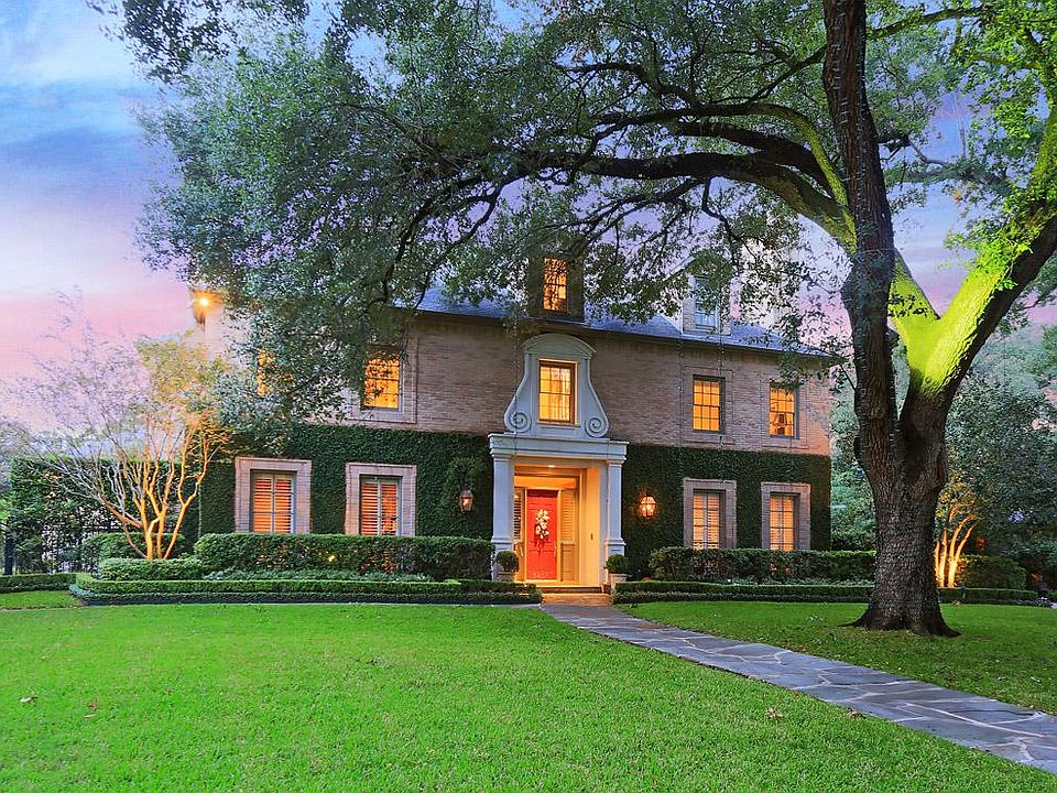 Exquisite traditional home with a slight modern edge. Located in the heart of Tanglewood, this home offers gorgeous trees, fine spaces for entertaining and custom finishes and details.