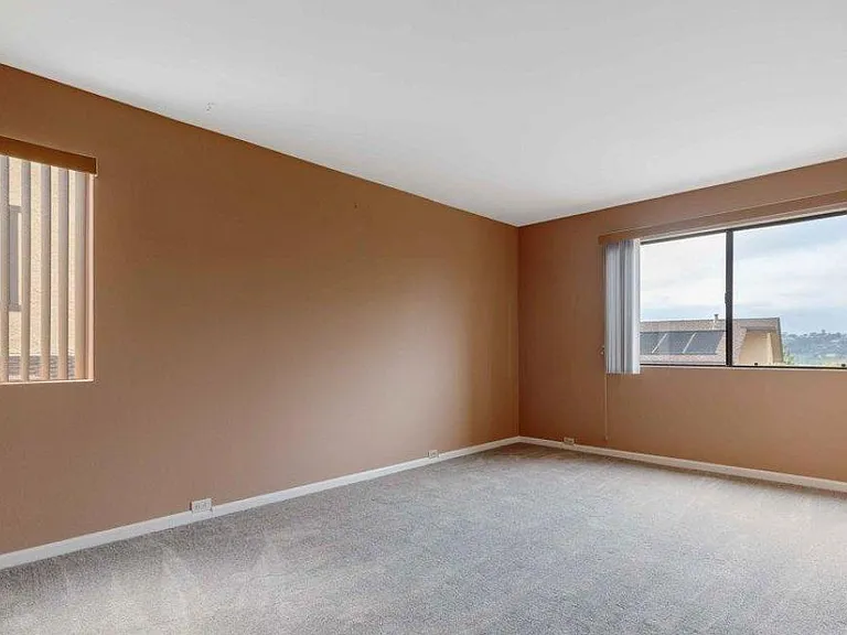 Large master bedroom. Updated paint colors.