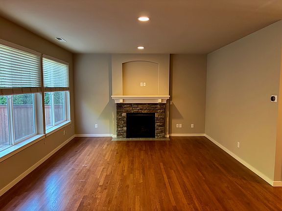 Open concept Family Living room with backyard view.
