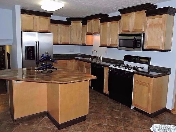 open kitchen maple cabinets