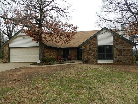 5 acres m/l on park like setting w/ mature trees and large home!