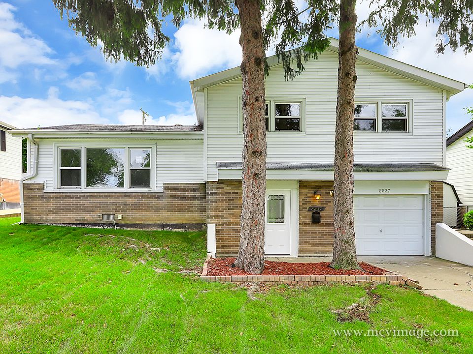 1st image of 8837 W 92nd St