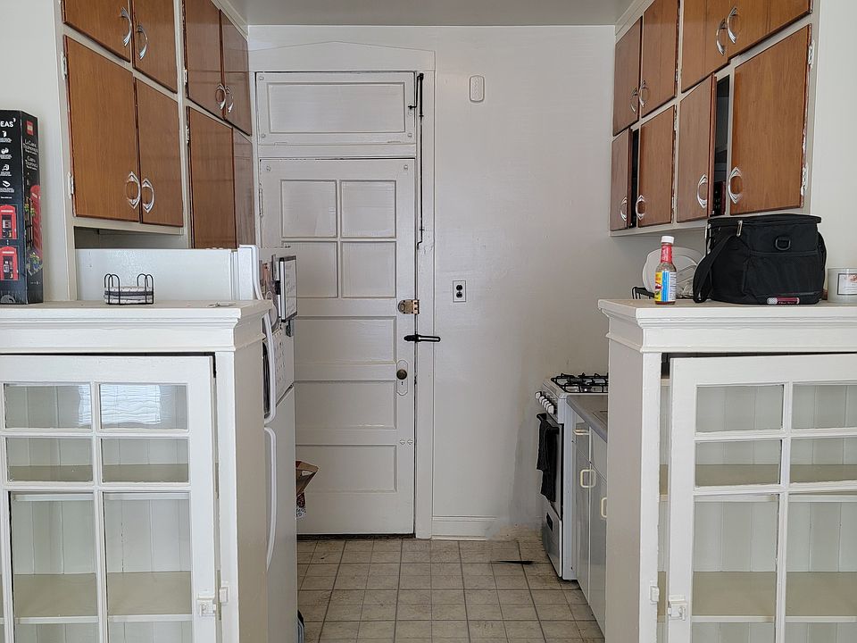 View of Kitchen from eating area, door way to back entrance