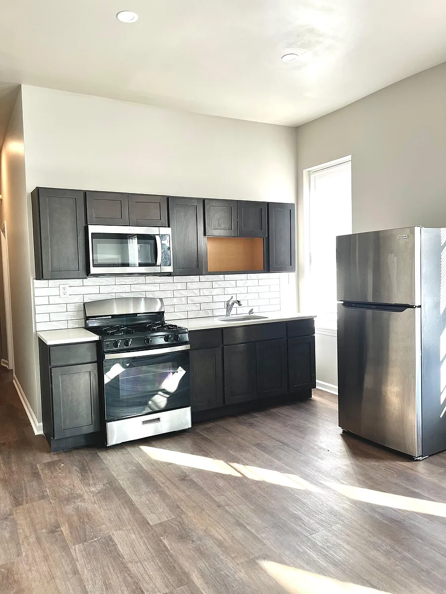 Building Photo - 1300 N 54th St #1