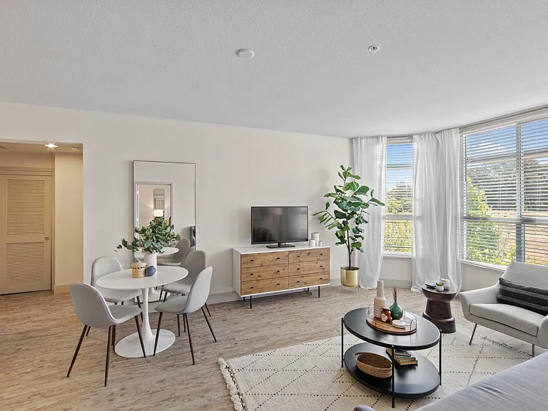 Unit Living Room with Large Windows and Natural Light at Aventine Apartments in Hercules, CA 94547