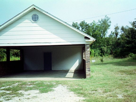 large carport with shop