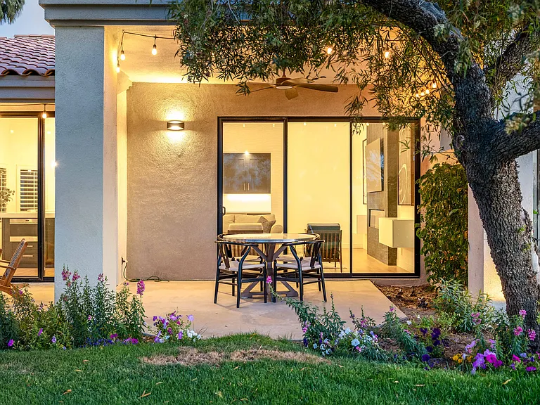 Cover patio directly in front of living room.