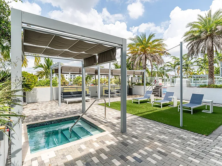 Courtyard View With Lounge Seating and Shade Structures