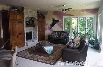 Hearth room with built in fireplace and cherrywood cabinets