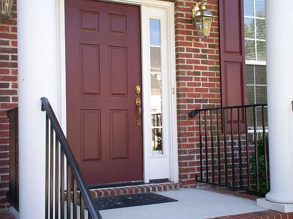 Brick Steps & Concrete Porch.  Great Entrance