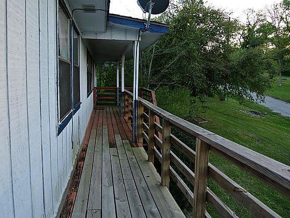 reach the deck from the front door or side door