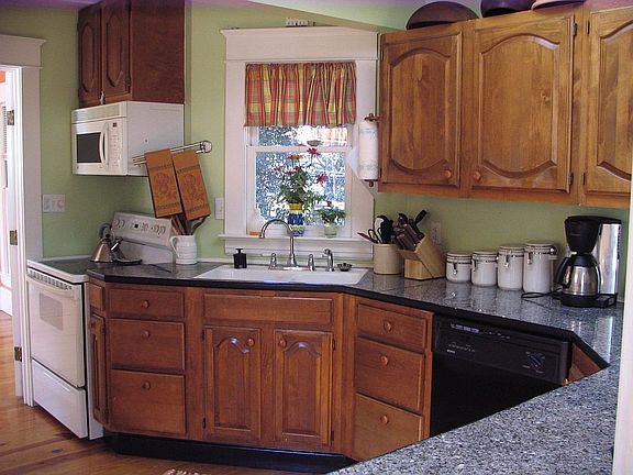 Kitchen with granite tile counters