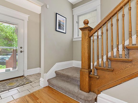 Foyer with front coat closet opens to beautiful entry hallway