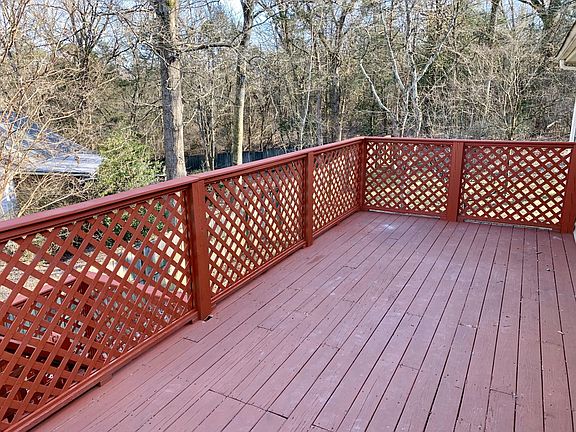 Large deck with shaded tree view