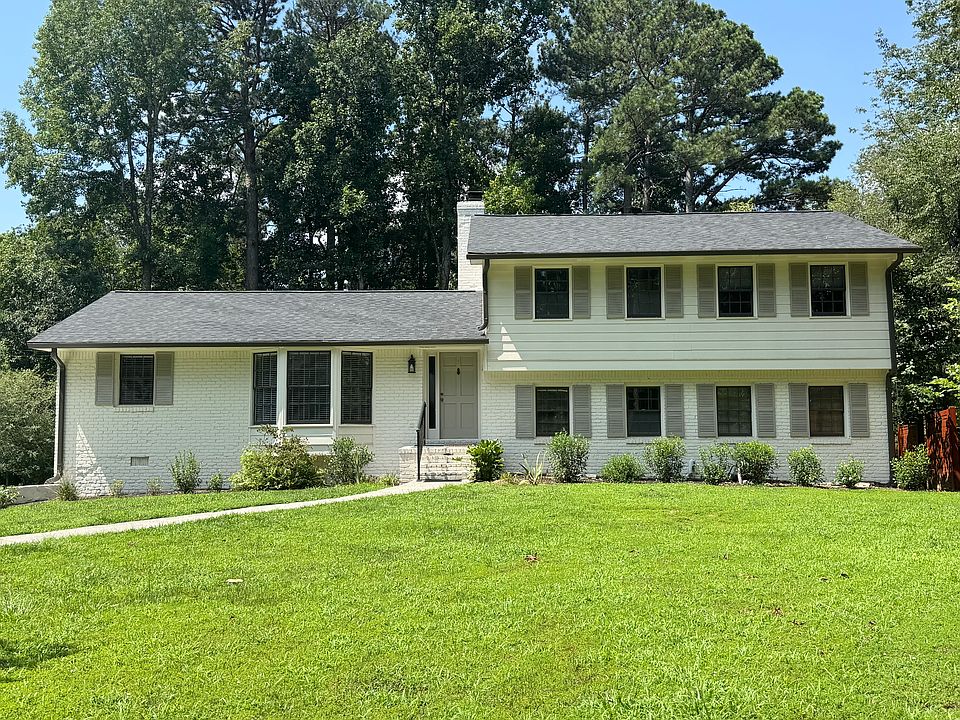 Freshly painted brick home with great curb appeal.