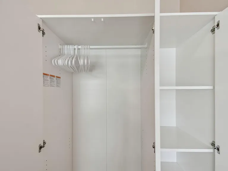 Armoire for hanging clothes and storage
