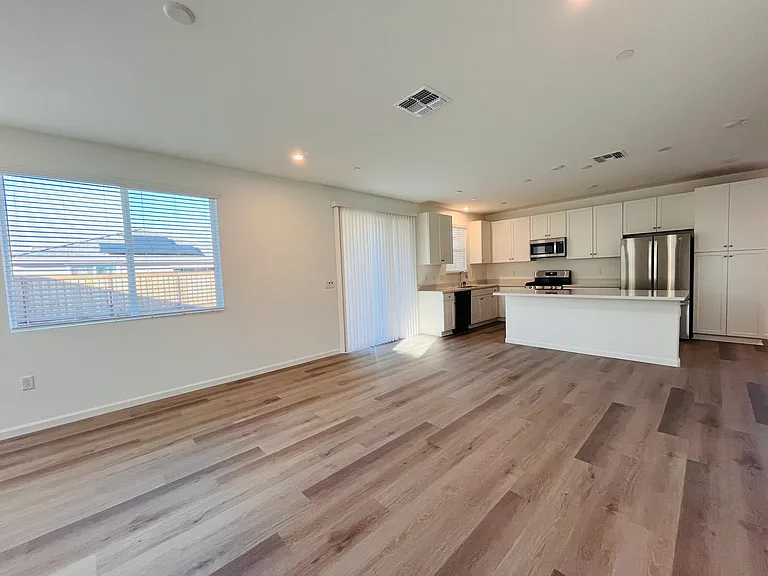 Kitchen view and windows w/ blinds