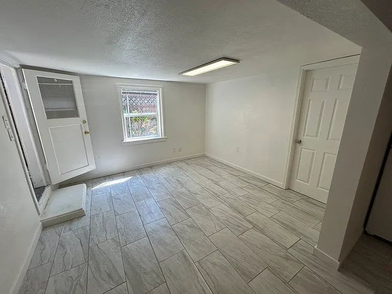 Living Room/Front Door/Bedroom Door.