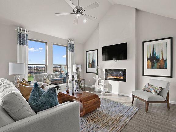 Living room in the Masters Plus home plan by Trophy Signature Homes - REPRESENTATIVE PHOTO