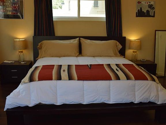 This is the KING size bed....plenty of light and air come into this spacious 440 square foot space!