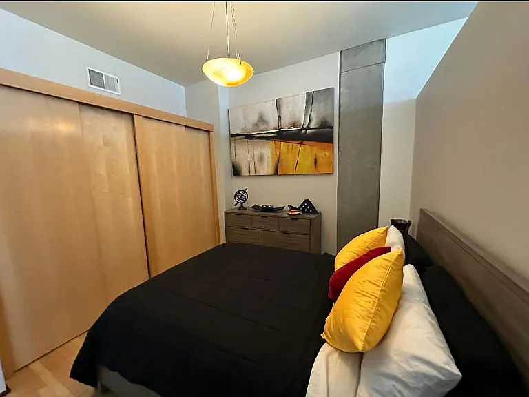 Guest bedroom with two large double door closets