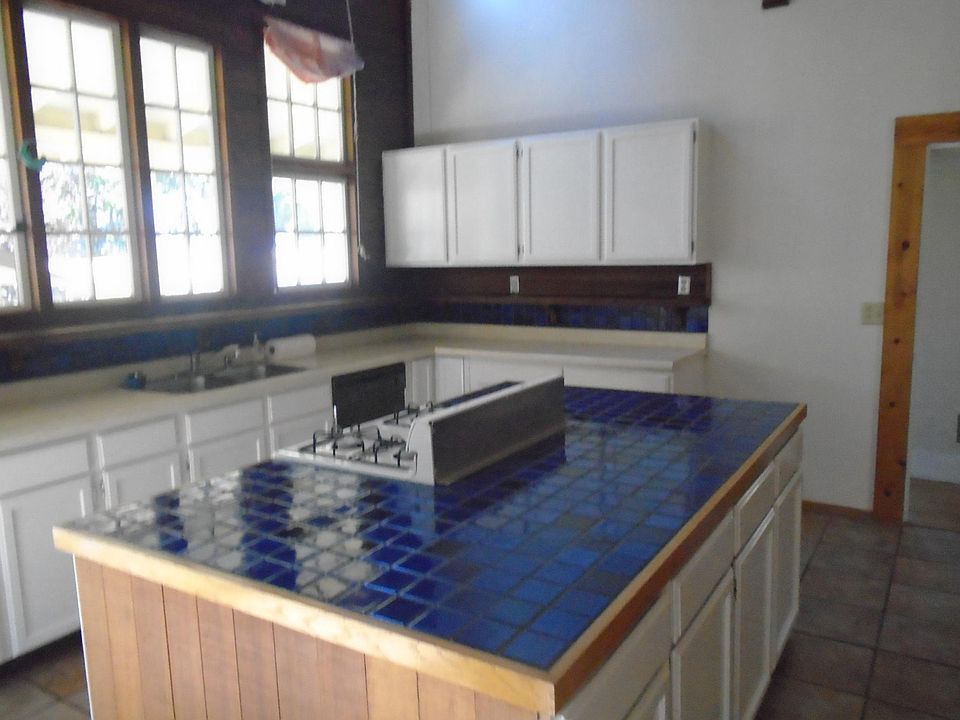 Kitchen with gas range.