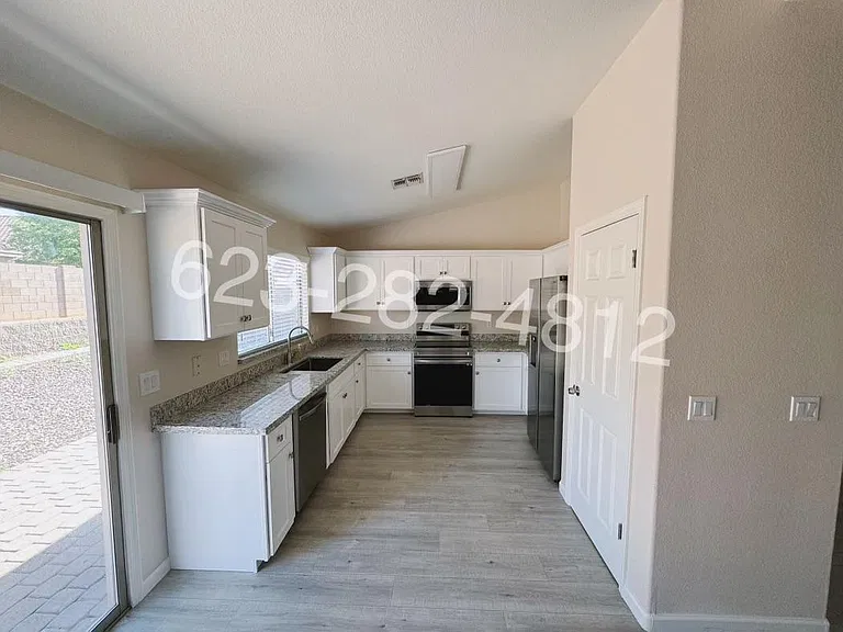 8556 W Carol Ave — Photo 6