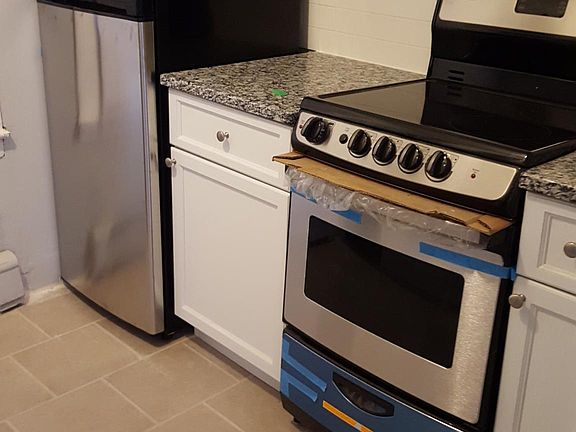 new appliances, electric stove, refrigerator