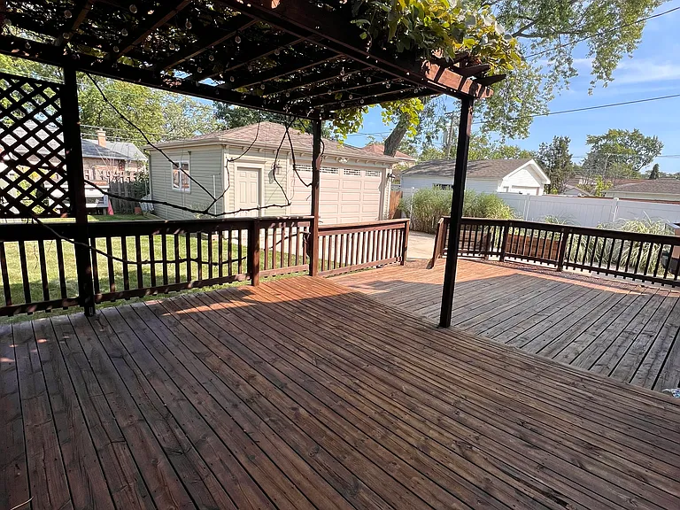 Gated large deck with pergola