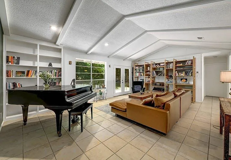 Living area with baby grand