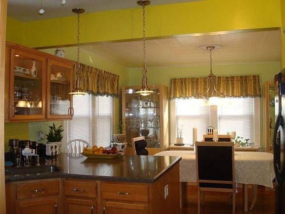 Updated Kitchen corian counters HW custom cabinetry