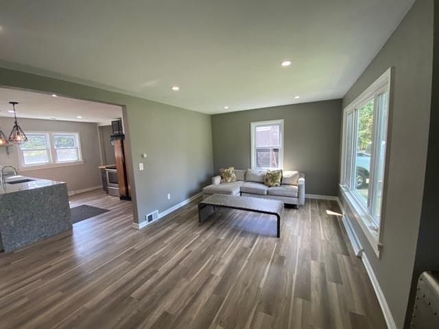 After entering the home you will find an open floorpan to living/dining/kitchen that is great for entertaining and everyday living.