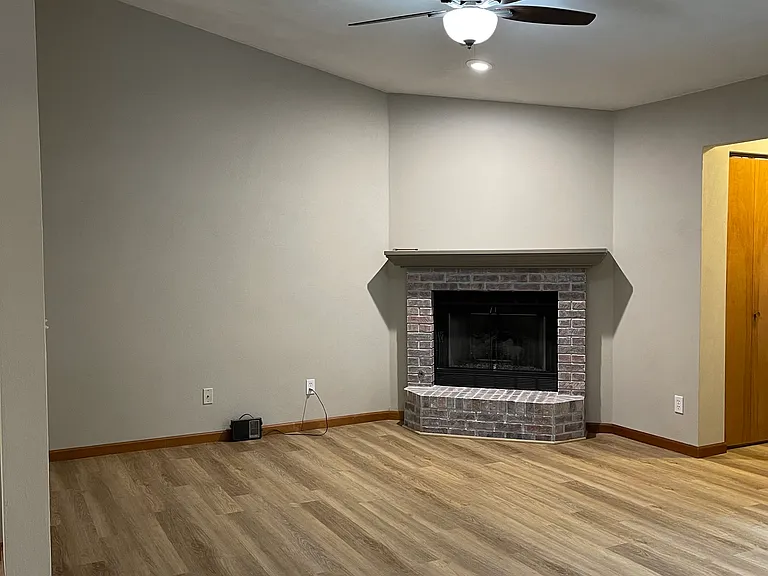 Living room with gas fireplace.