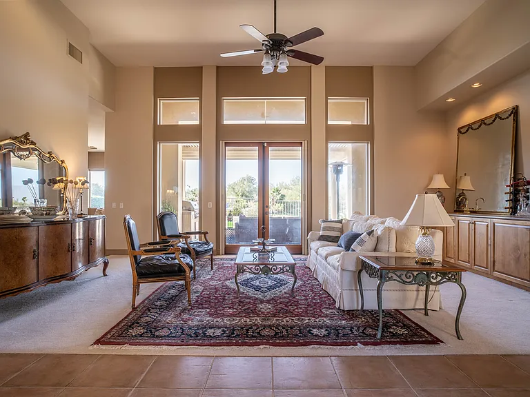 Spacious and elegant living room with bar sink,