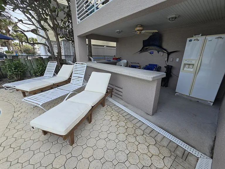 STORAGE FOR CHAIRS, BEACH TOYS, REFRIGERATOR AND CHAISE LOUNGE CHAIRS