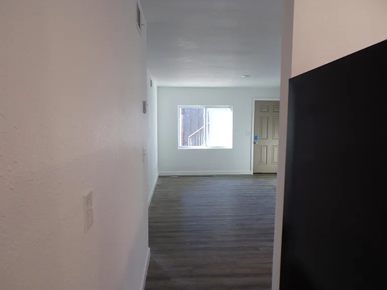 Hallway leaving kitchen
