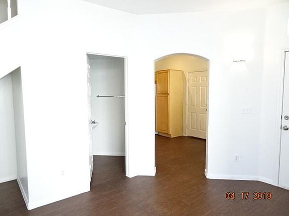 FOYER WITH ENTRY TO 1/2 BATH & KITCHEN