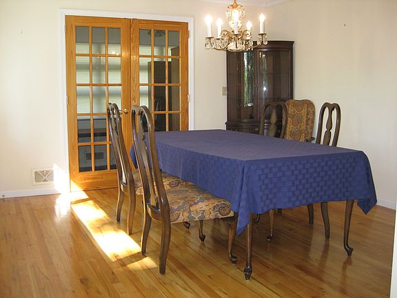 Formal Dining Room opening onto Den.