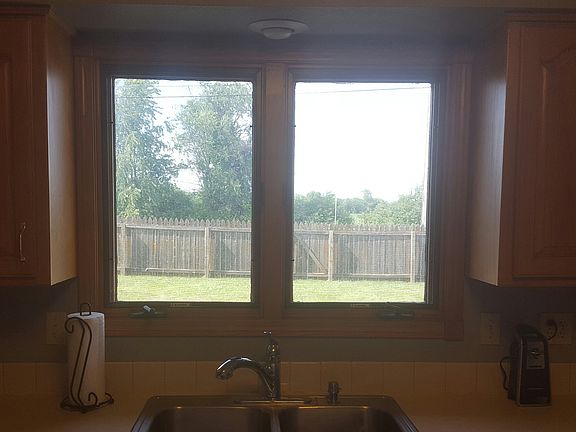 View of fenced in back yard 