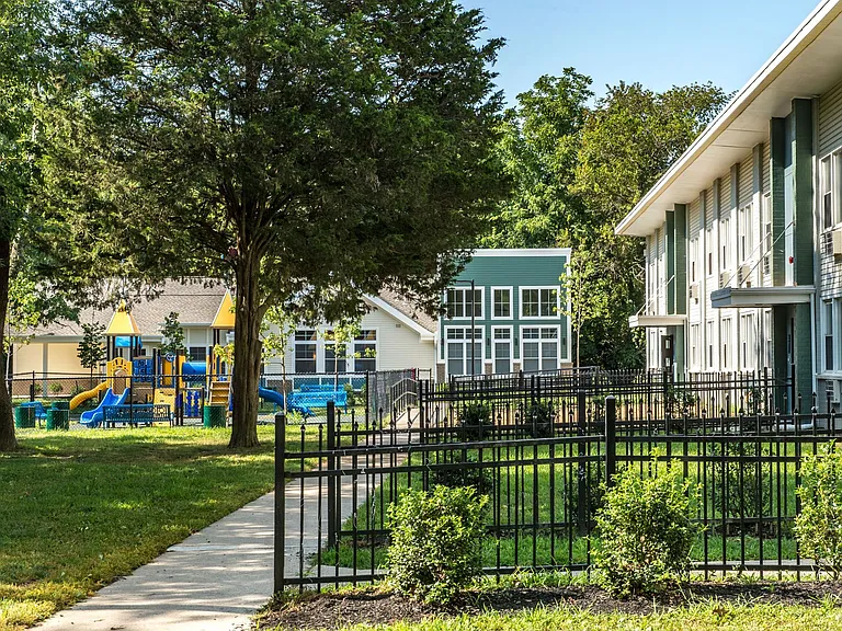 Outside of Building With Playground In Background