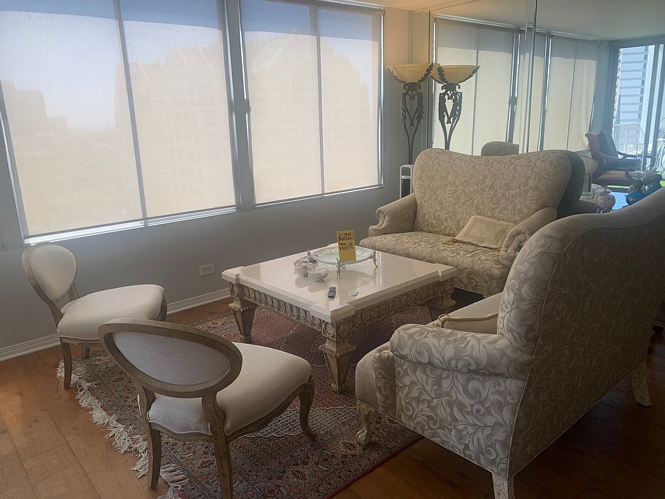 Living room with Roman shades,