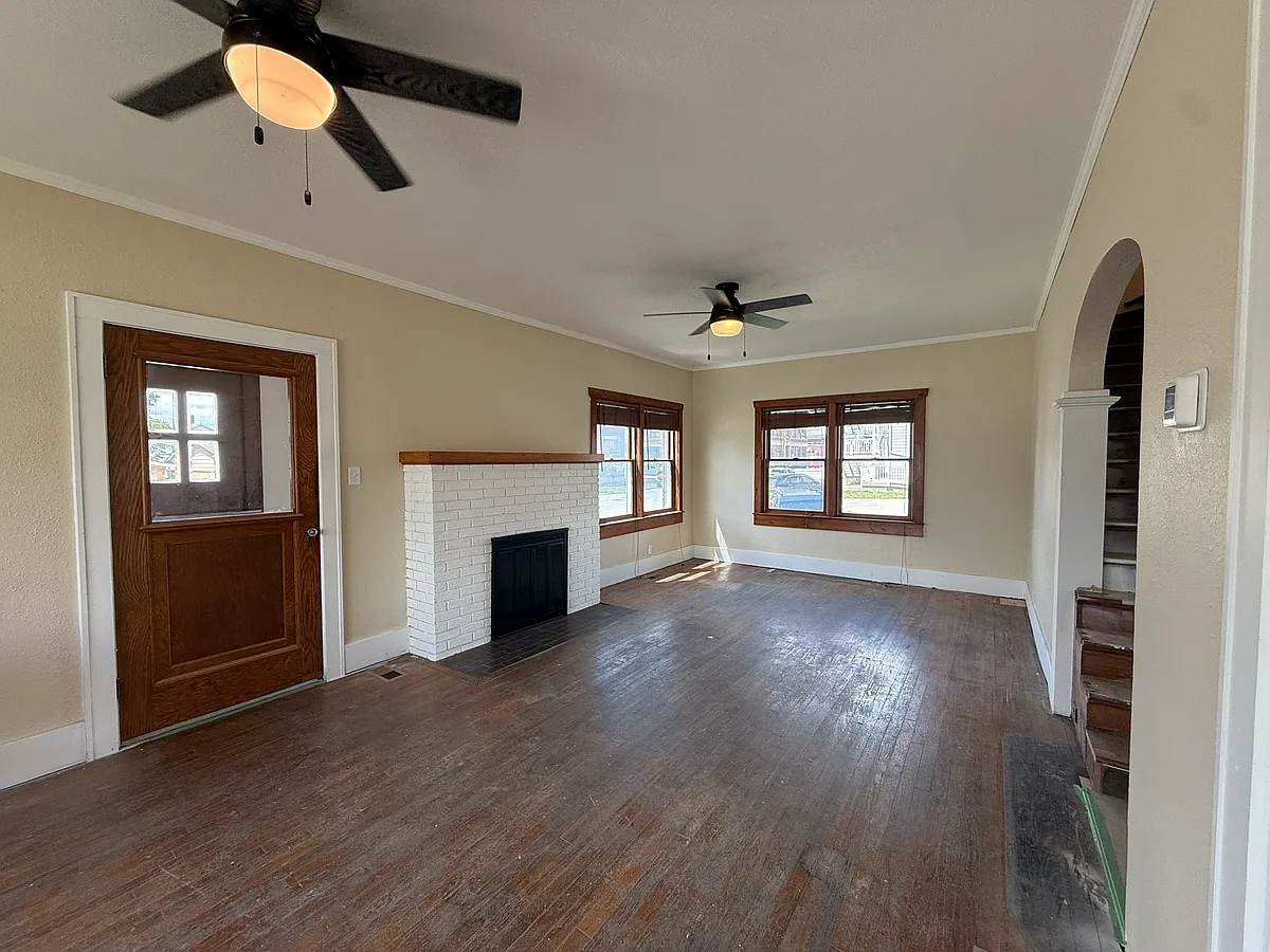 Hardwood floors are being refinished. Fireplace is non-functional. - 315 S Elson St