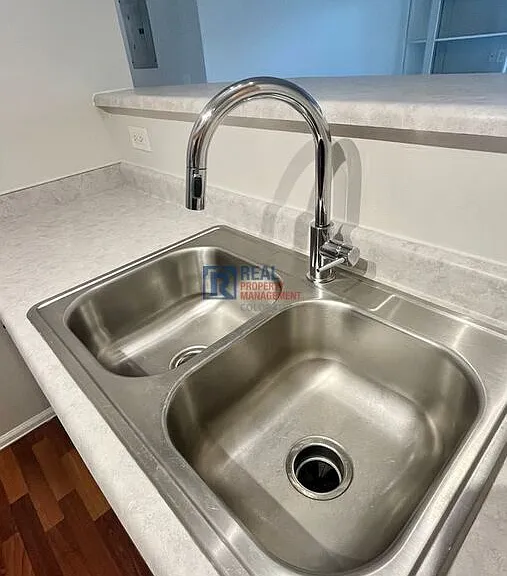 10784 W 63rd Pl #103 — Photo 9